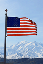 U.S. flag with mountains